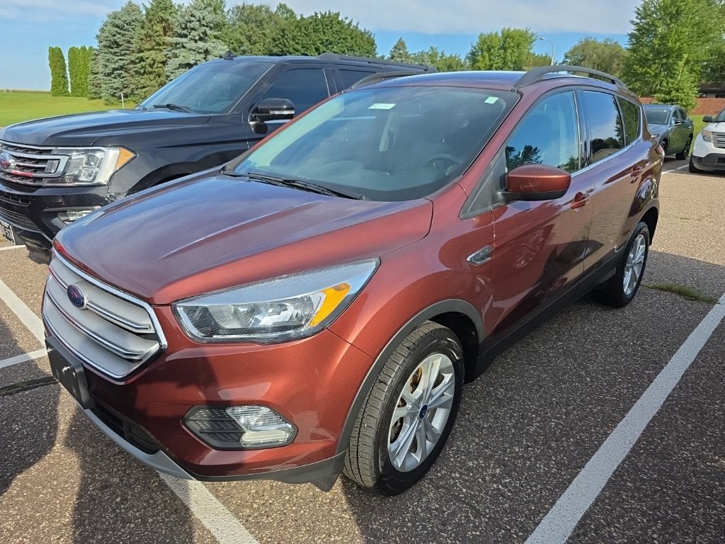 Used 2018 Ford Escape SE with VIN 1FMCU9GD7JUB68920 for sale in Sauk City, WI
